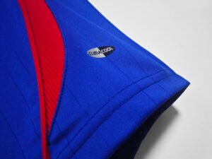 2006 France Home WC ‘06 Retro Soccer Jersey featuring the classic blue design worn by Zidane and the French national team during the 2006 World Cup.