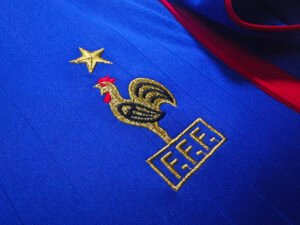 2006 France Home WC ‘06 Retro Soccer Jersey featuring the classic blue design worn by Zidane and the French national team during the 2006 World Cup.