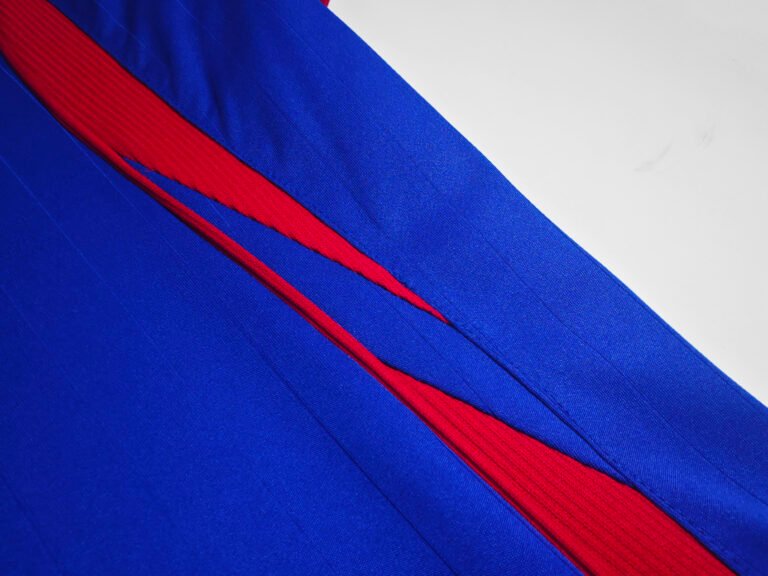 2006 France Home WC ‘06 Retro Soccer Jersey featuring the classic blue design worn by Zidane and the French national team during the 2006 World Cup.