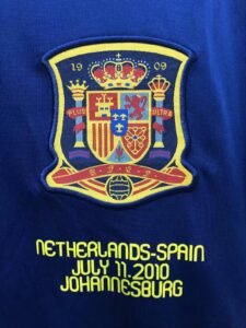 2010 Spain Away PUYOL #5 Retro Jersey – Official Spain national team classic design, commemorating the 2010 World Cup victory, perfect for football fans and collectors.