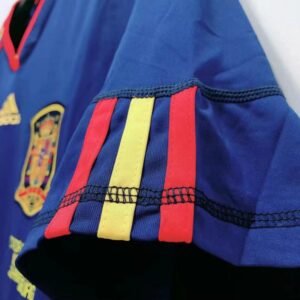2010 Spain Away PUYOL #5 Retro Jersey – Official Spain national team classic design, commemorating the 2010 World Cup victory, perfect for football fans and collectors.
