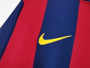2014/15 Barcelona Home Messi #10 Jersey, worn by Lionel Messi during the 2014/15 season, featuring the iconic FC Barcelona colors and Messi's legendary #10.