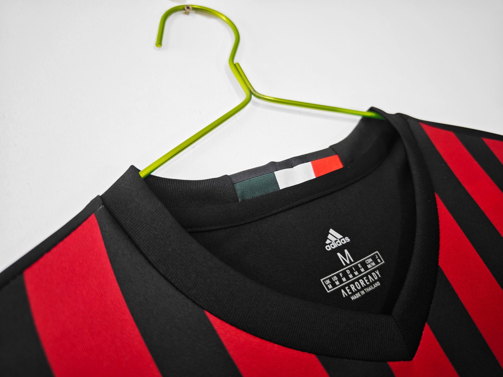 2016/17 AC Milan Home Retro Football Jersey – Classic red and black striped kit with vintage club detailing.
