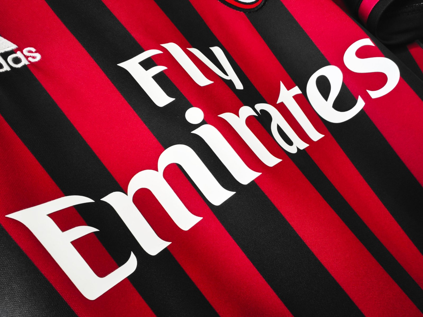 2016/17 AC Milan Home Retro Football Jersey – Classic red and black striped kit with vintage club detailing.