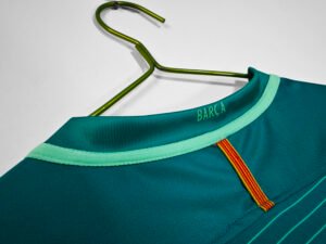 Barcelona 2016/17 Messi third jersey, featuring the iconic Barça #10 design in the club’s vibrant away colors.