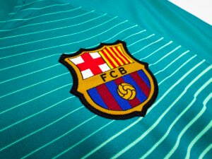Barcelona 2016/17 Messi third jersey, featuring the iconic Barça #10 design in the club’s vibrant away colors.