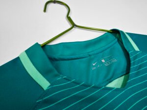 Barcelona 2016/17 Messi third jersey, featuring the iconic Barça #10 design in the club’s vibrant away colors.