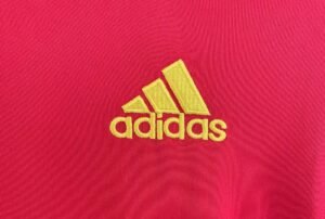 Spain 2010 Home Puyol #5 Retro Jersey – Official Spain National Team classic shirt celebrating Puyol’s iconic moments in the 2010 FIFA World Cup.