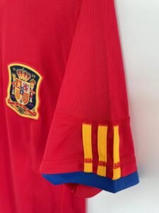 Spain 2010 Home Puyol #5 Retro Jersey – Official Spain National Team classic shirt celebrating Puyol’s iconic moments in the 2010 FIFA World Cup.